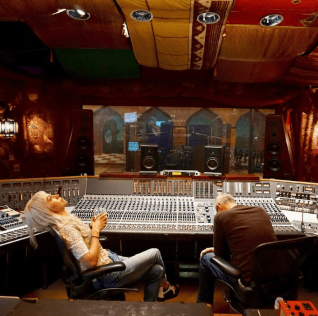 Leticia Wolf sitting with Page Hamilton of Helmet at NRG studio in Los Angeles, listening to recordings.